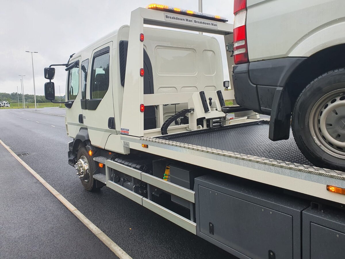 Breakdown Man flatbed recovery truck ready for a callout, covering Warrington and the wider North West.