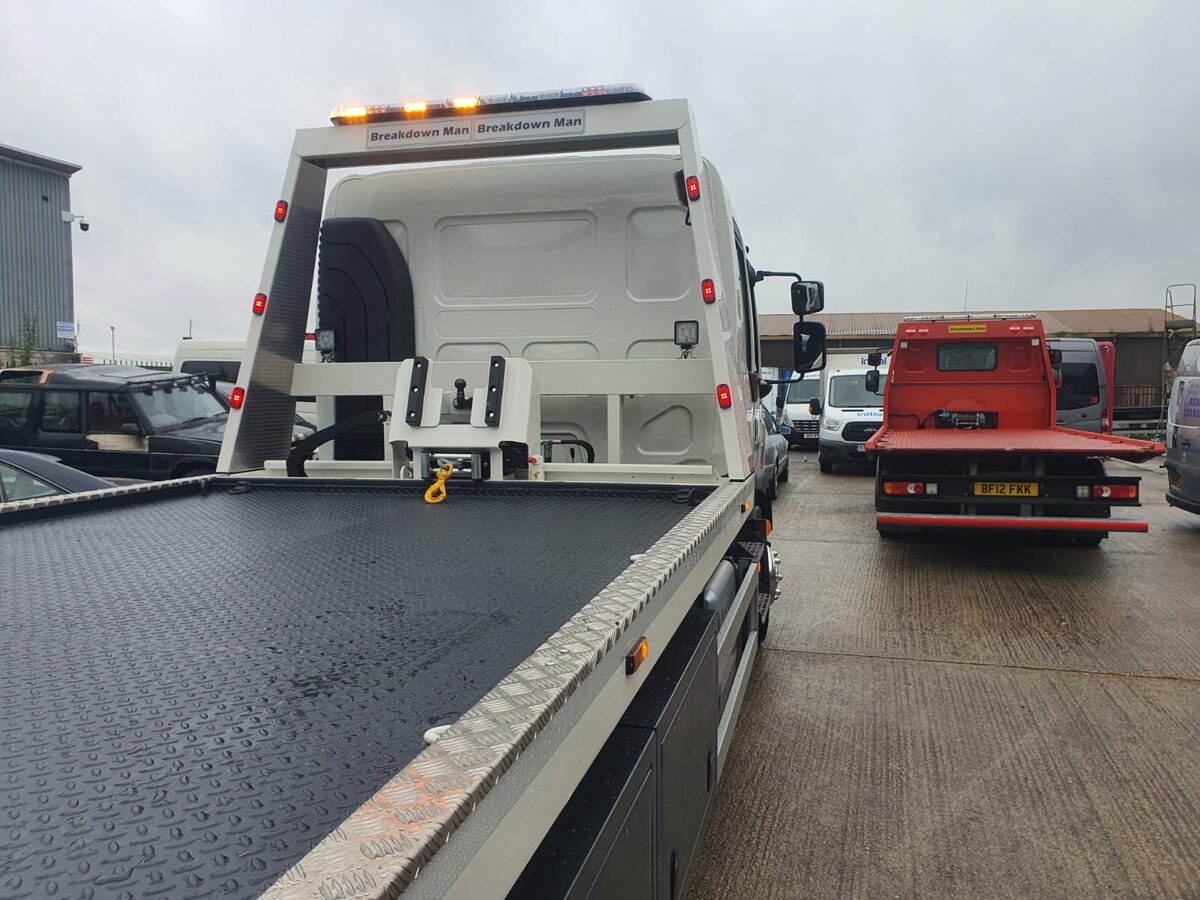 Breakdown Man flatbed recovery truck at the Wigan depot ready for a vehicle recovery callout.