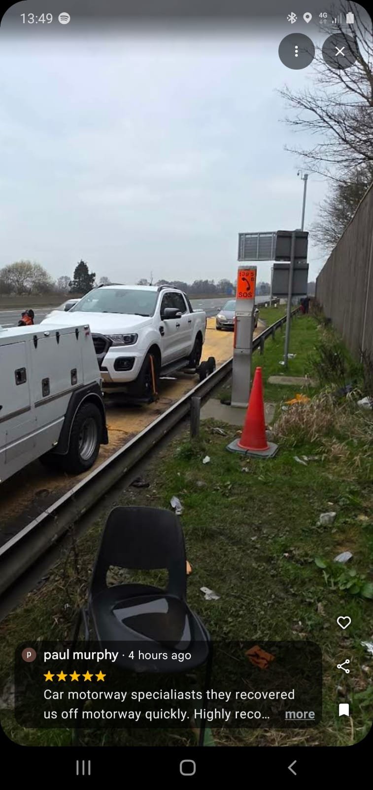 White Ford Ranger recovered on the motorway hard shoulder.